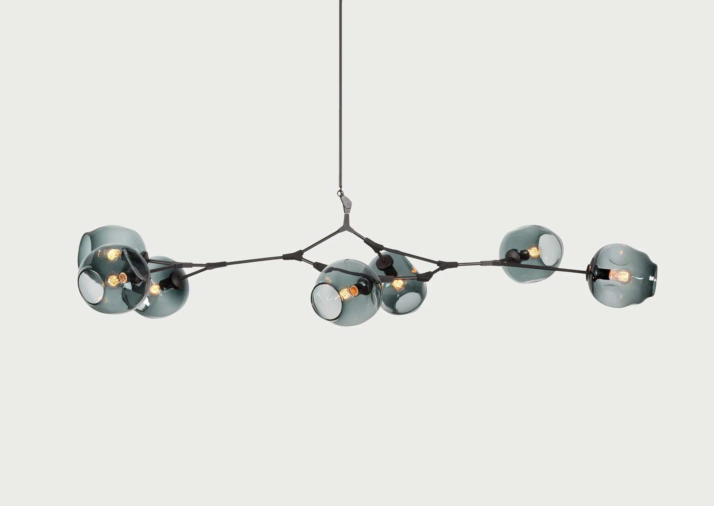 Arlo Moderner, verzweigter Glas-Kronleuchter mit 7 Leuchten, schwarz.jpg__PID:c1e88177-73f6-4df5-bd77-cce981bd7785