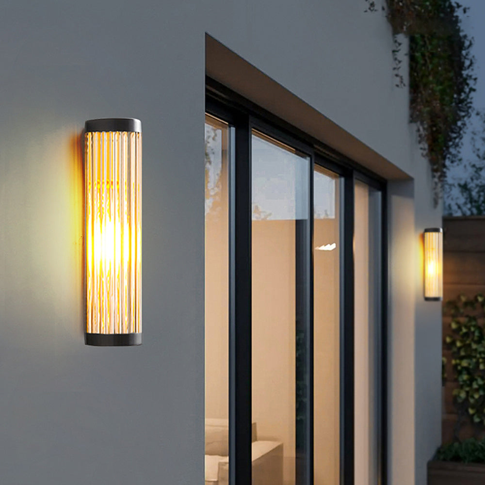 Eirulys Modern Cylindrical Glass Wall Light (2).webp__PID:29239dc8-0184-46f6-9f3e-c70b496c1972