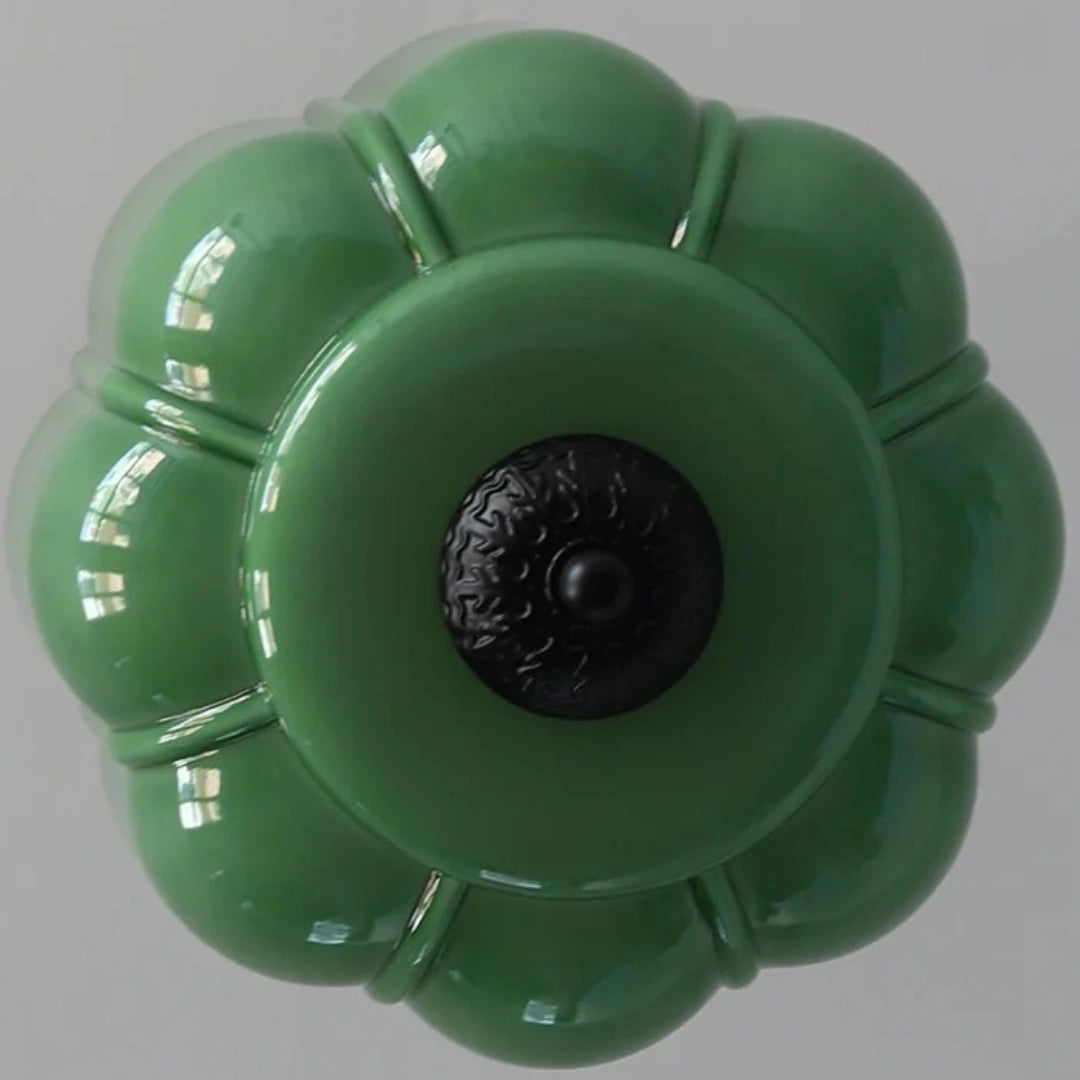 Green glass and black finial detail