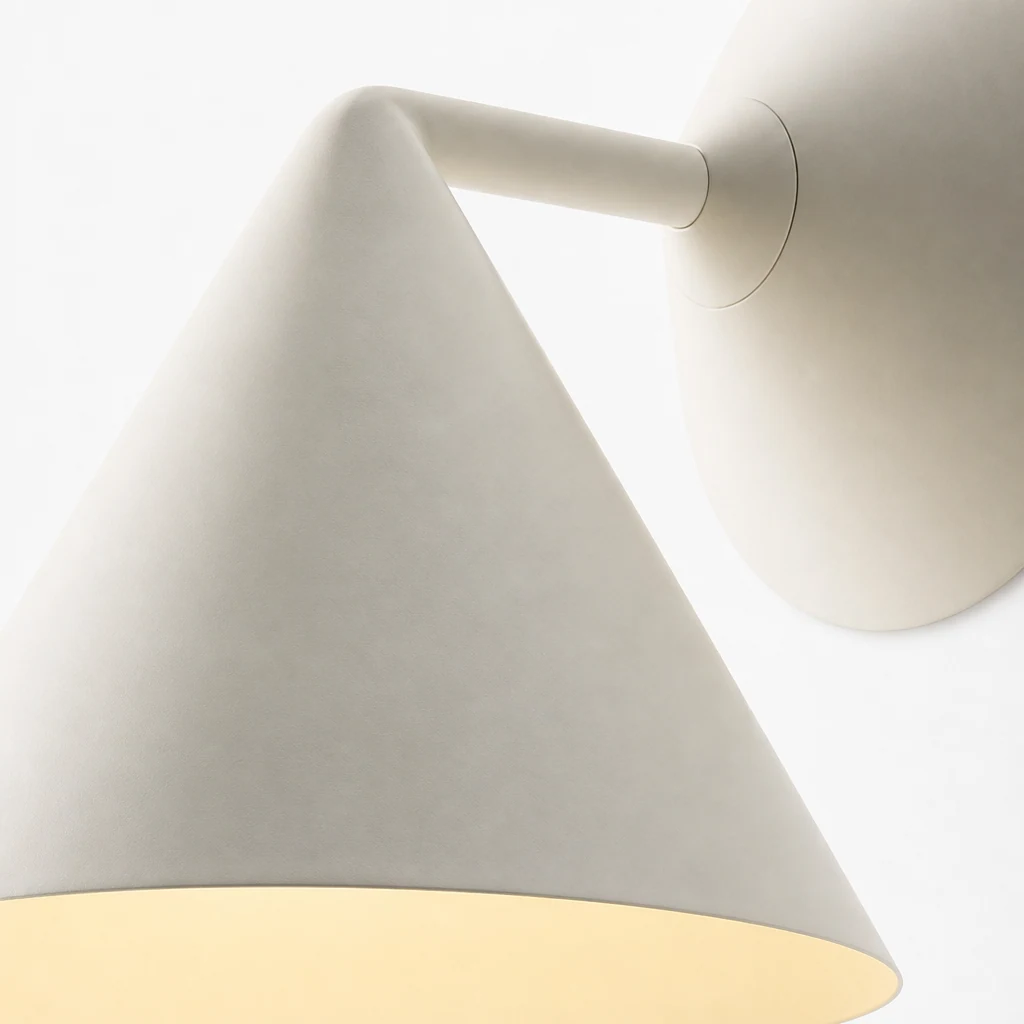 Close-up detail of the Maven metal cone shade wall sconce