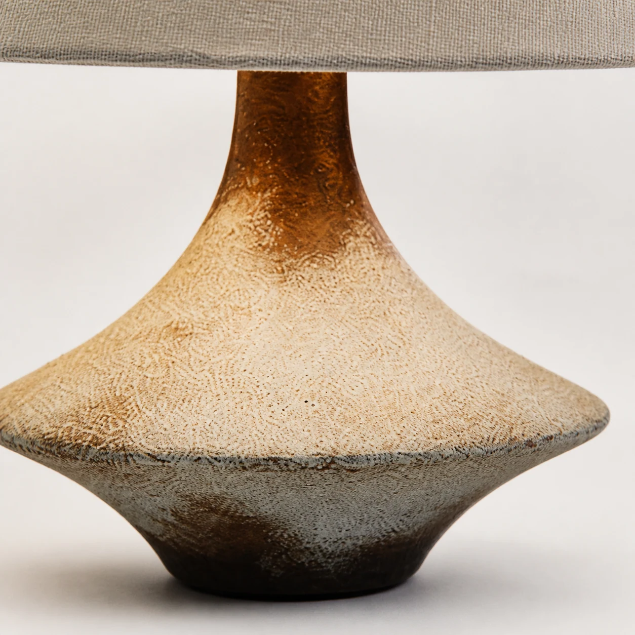 Close-up detail of the Napa ceramic table lamp material and shade