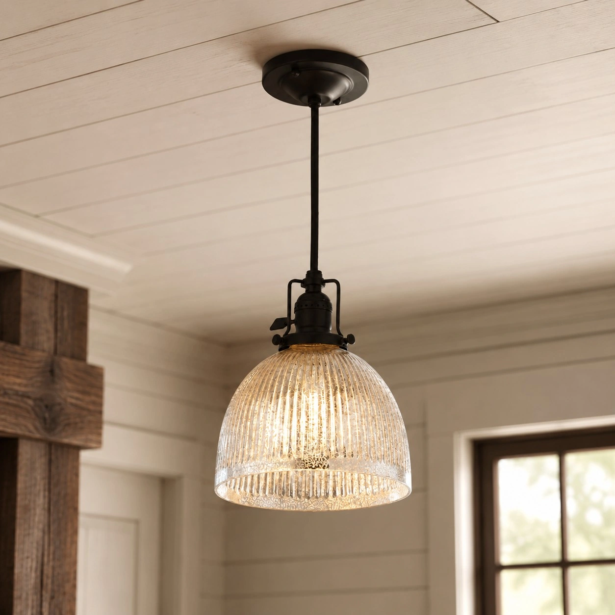 Baloch pendant installed in an interior scene with ribbed glass illuminated