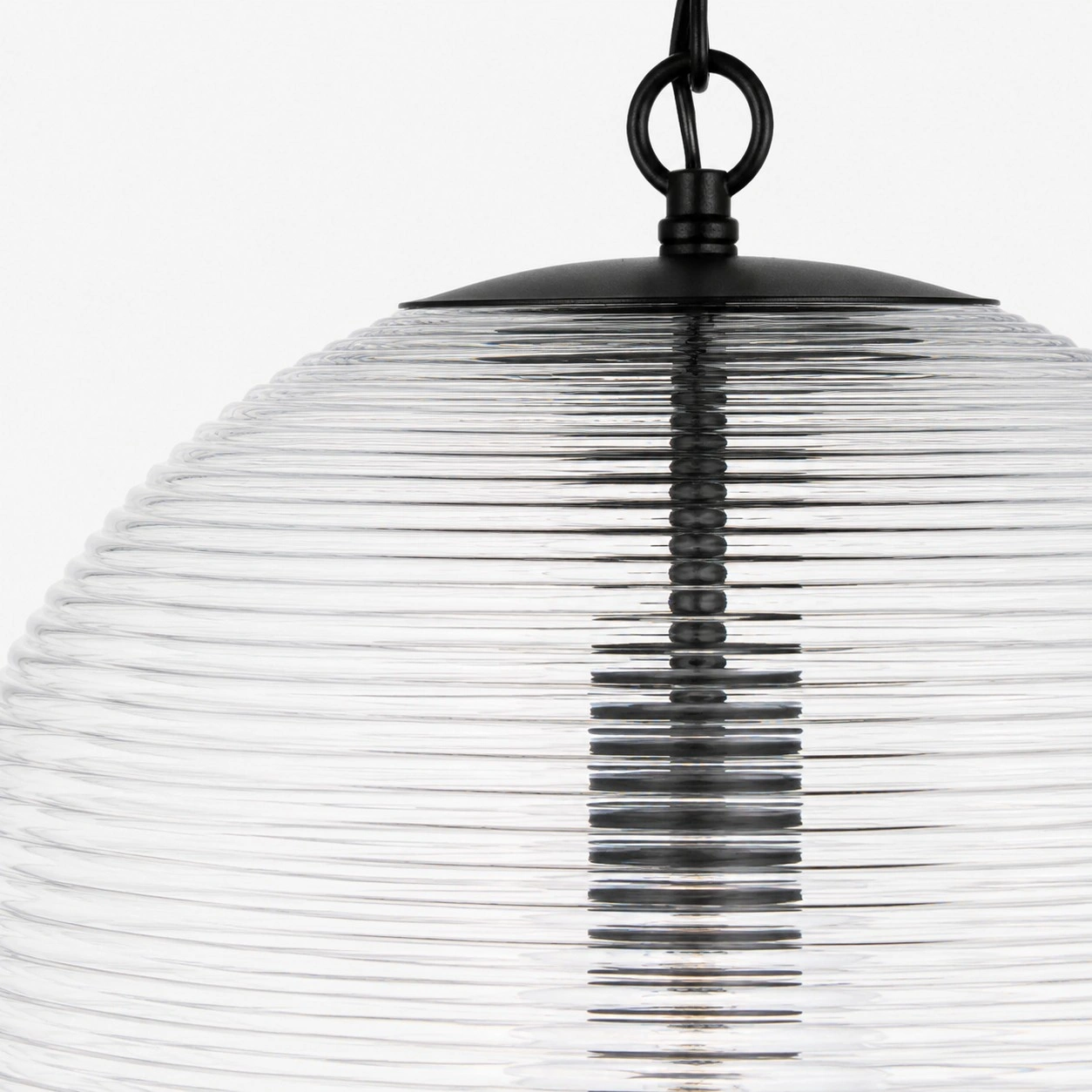 Close-up of Matte Black hardware, ribbed glass, and central socket assembly