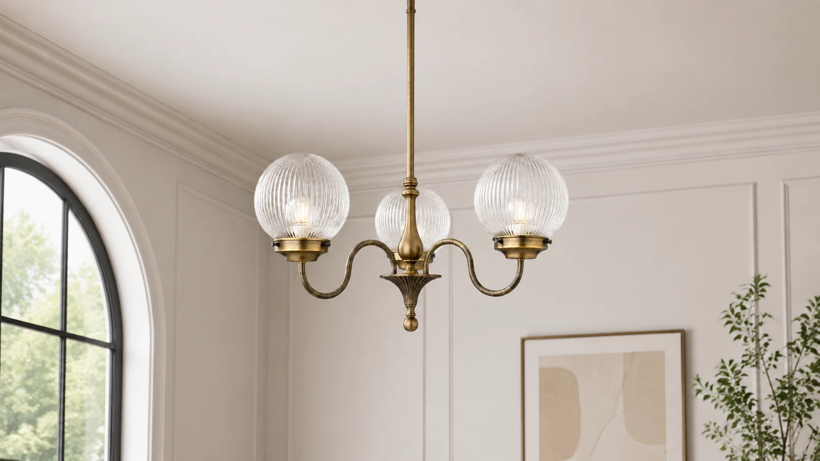 Vanessa 3-light ribbed glass globe chandelier in a warm interior room