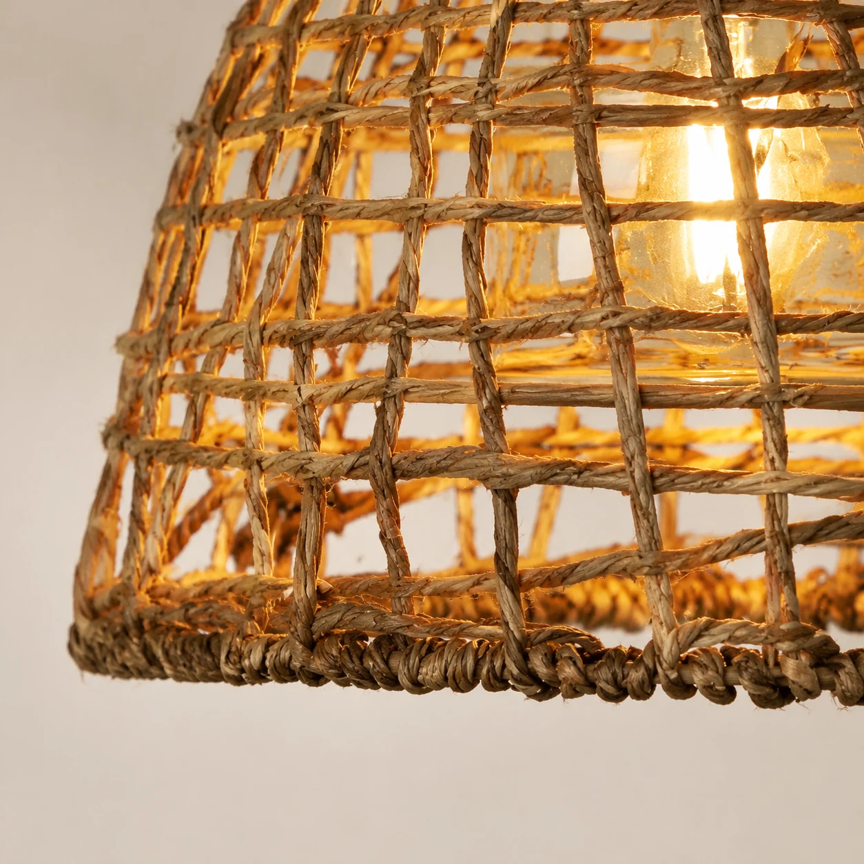 Close-up detail of the Farhany rattan pendant shade texture