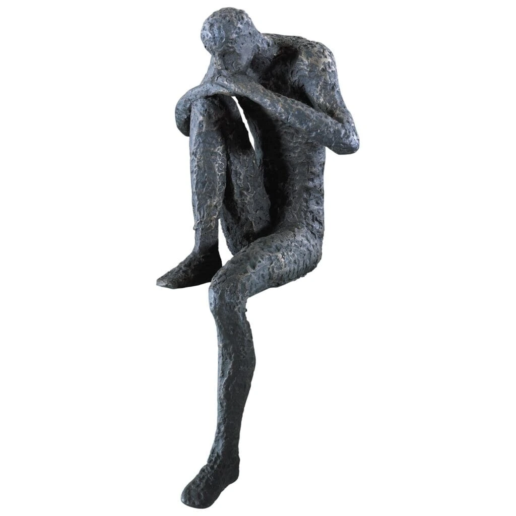 Contemplation cast iron shelf sculpture on white