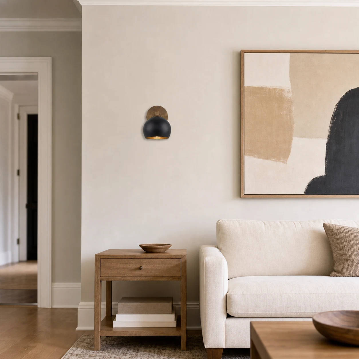 Adrian single wall light in a living room