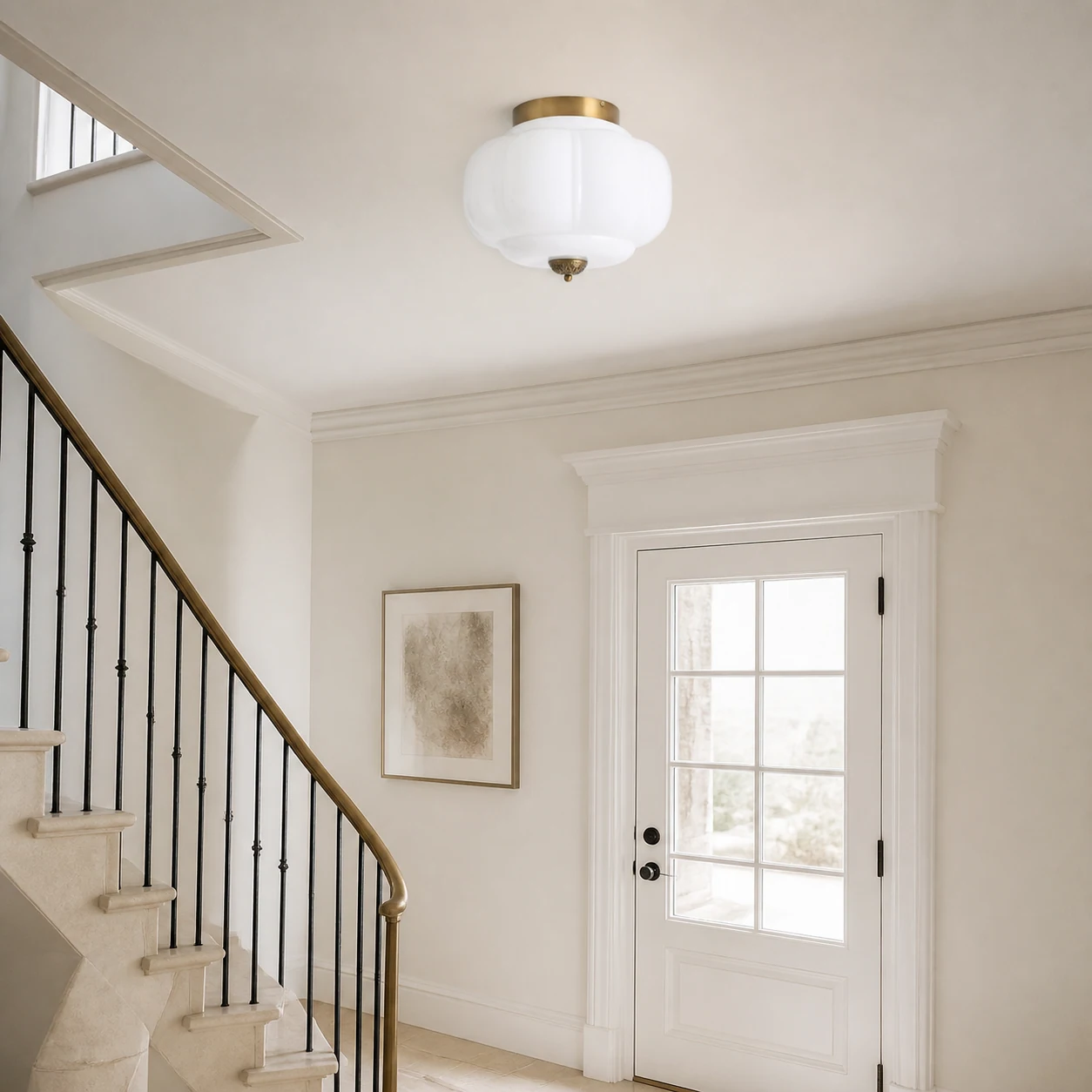 White and brass Breckett ceiling light on a stair landing