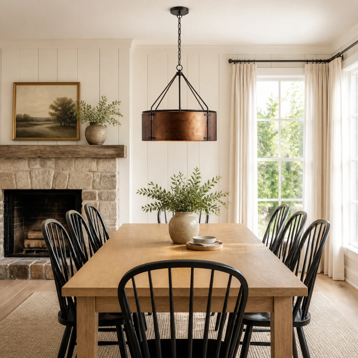 Creed bronze drum pendant above a bright dining table