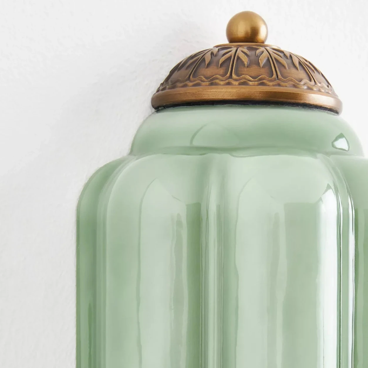 Calynis brass upper cap and green fluted glass detail