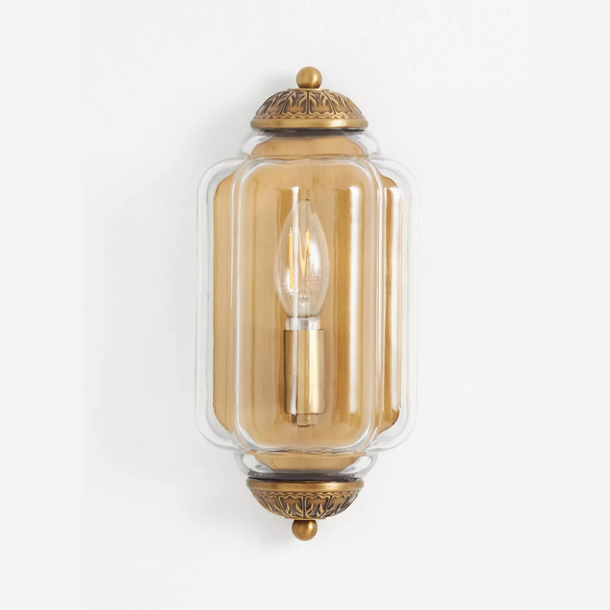 Calynis clear glass brass wall light
