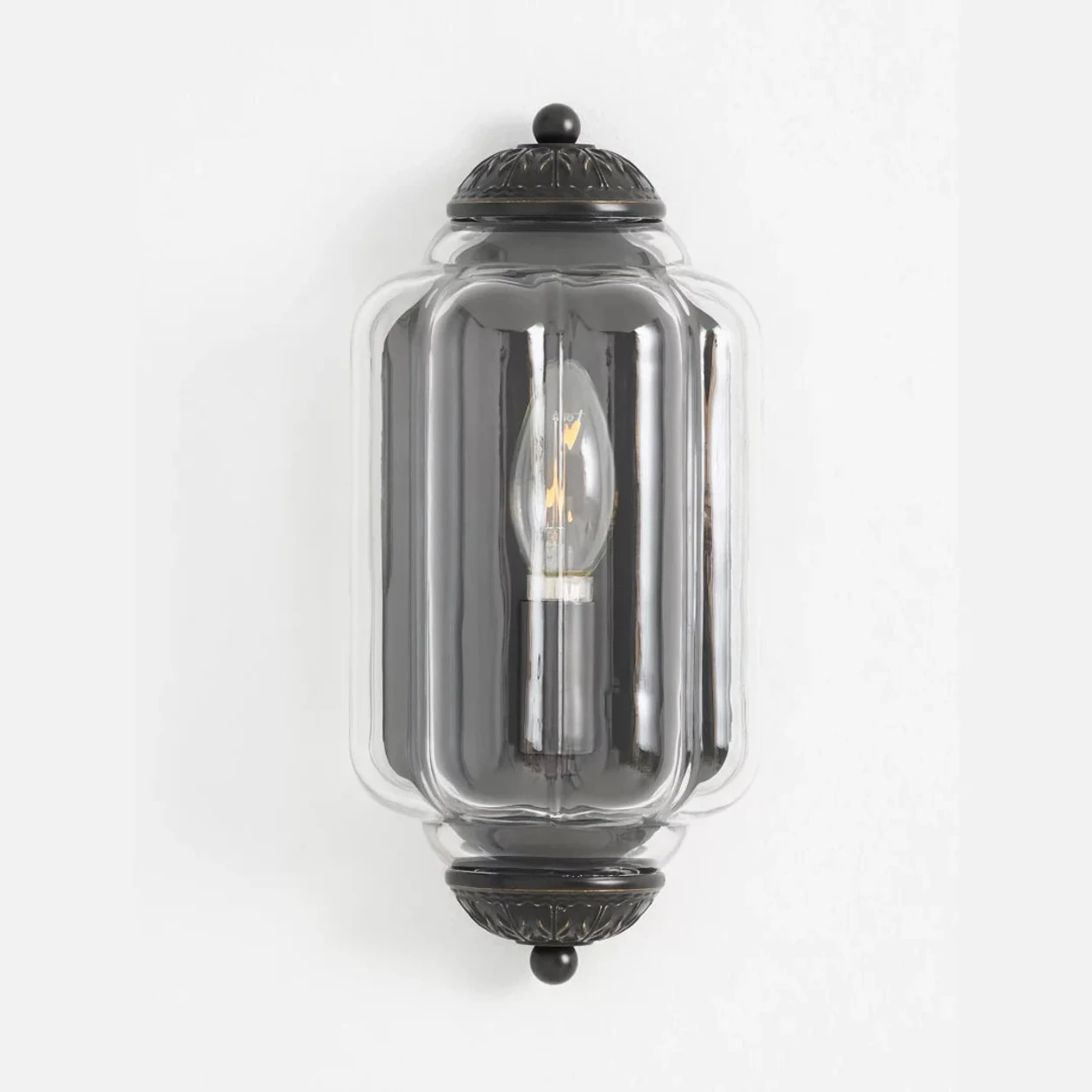Calynis clear glass black wall light