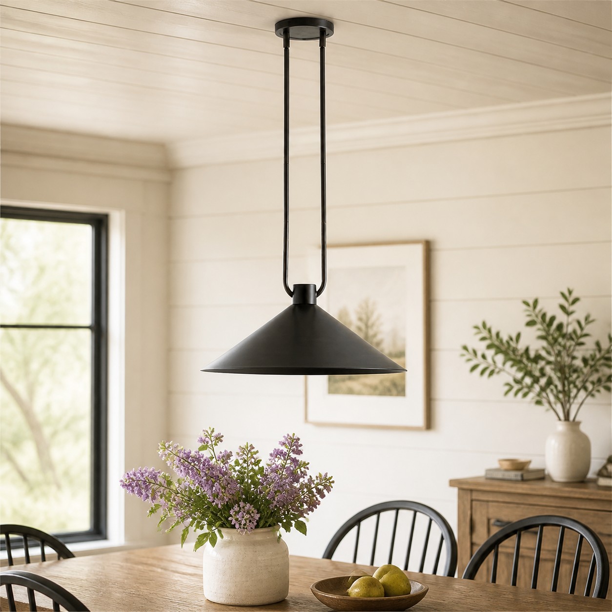 Black Zane pendant shown fully in a bright dining room