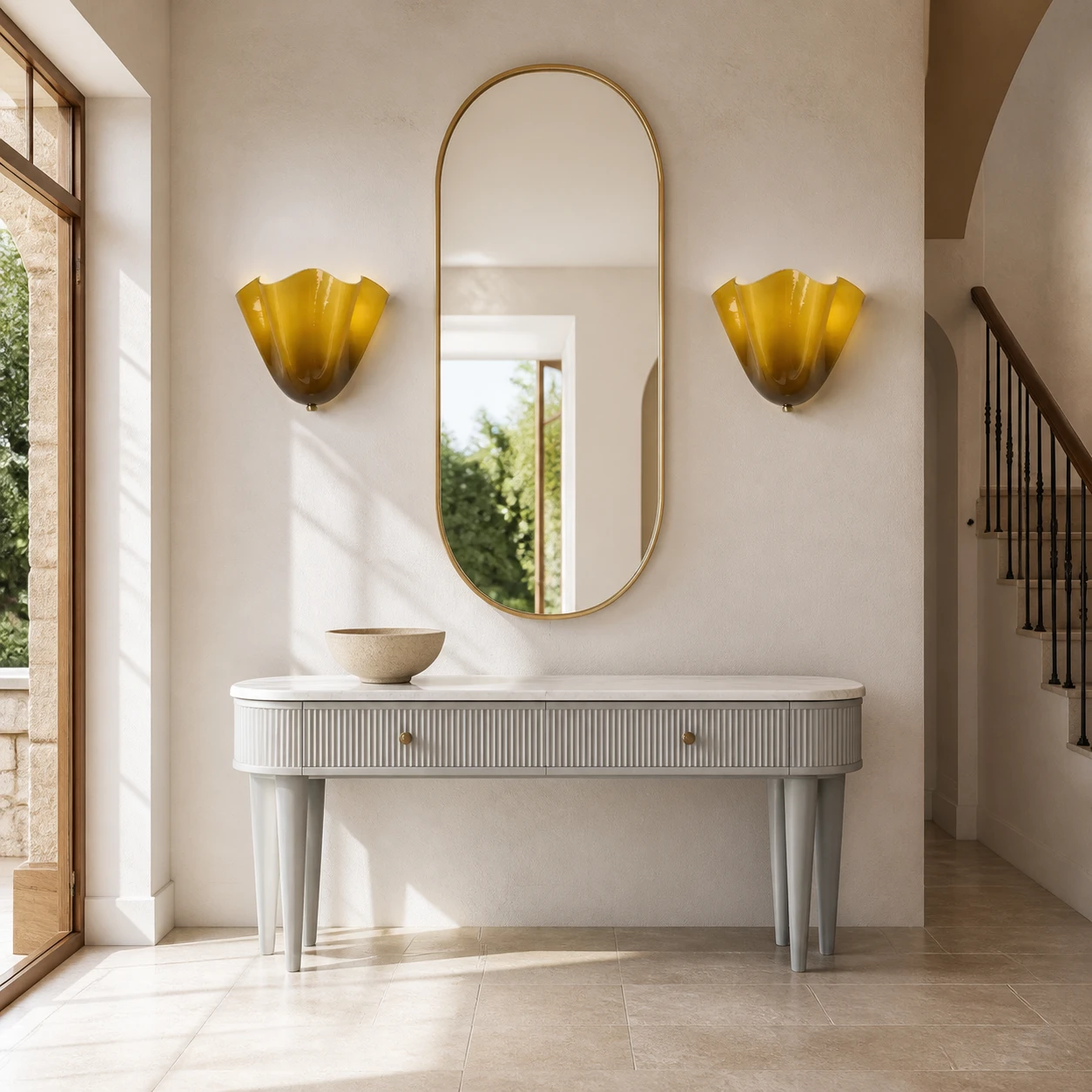 Pair of Hett sconces beside an entry mirror