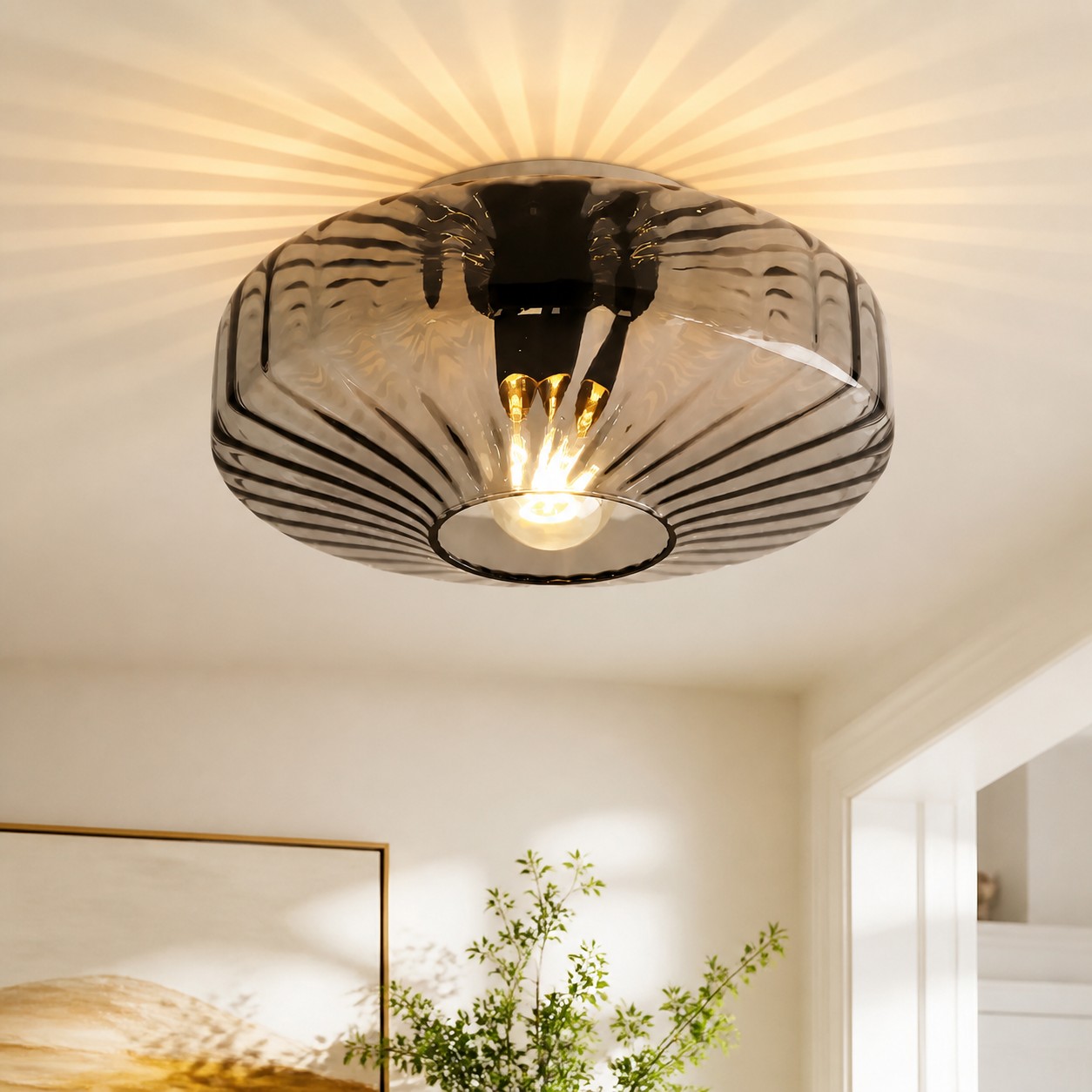 Smoke gray Cocytus ceiling light in a bright interior