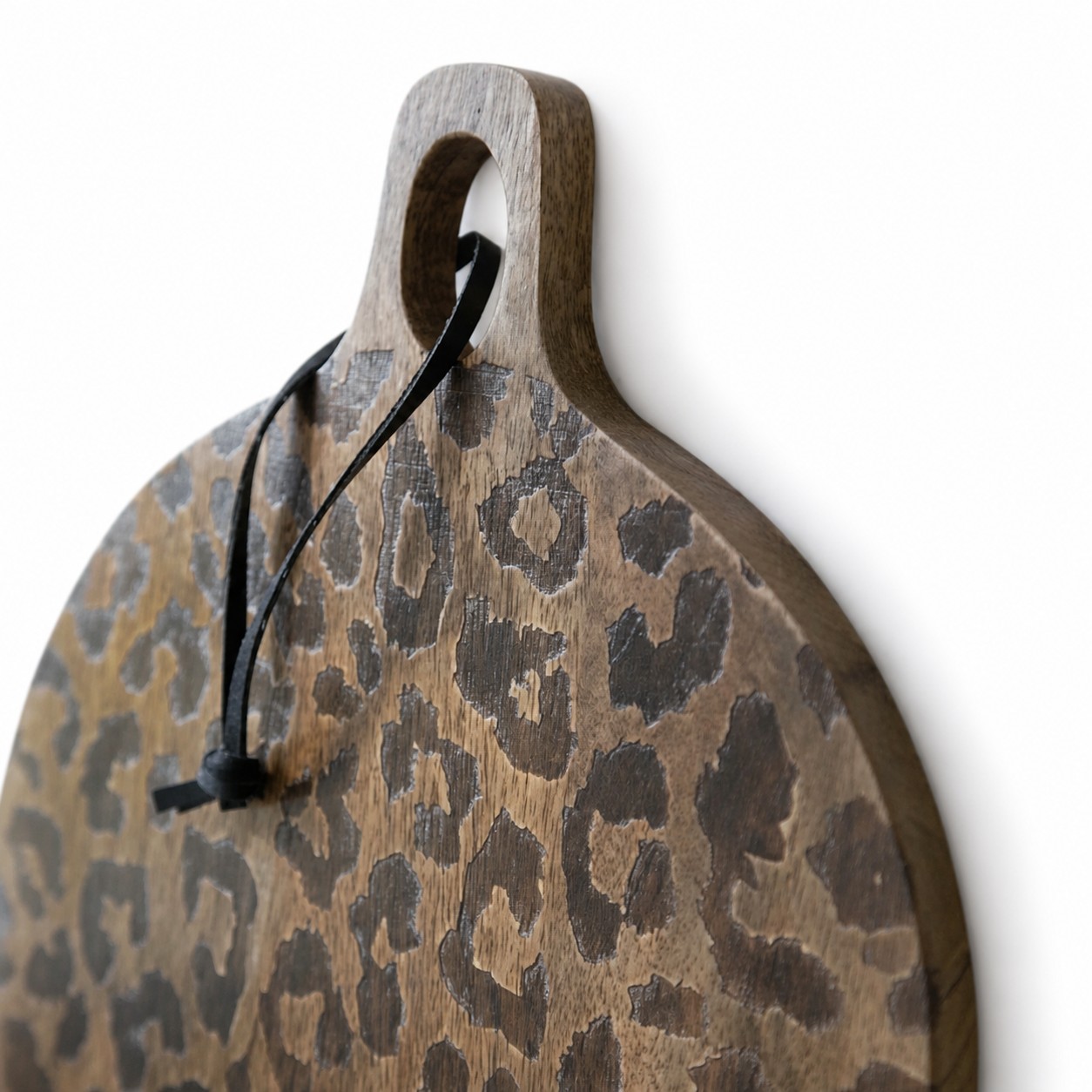 Close-up of the Powell board handle and patterned wood edge