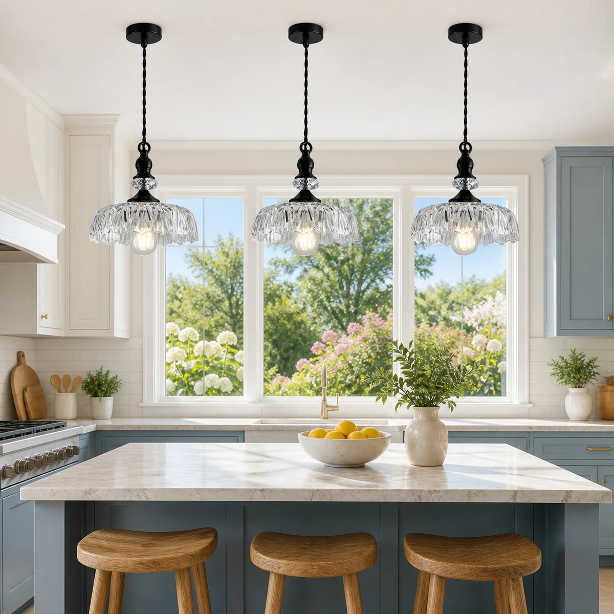 Three black and clear glass pendants in a garden-facing kitchen