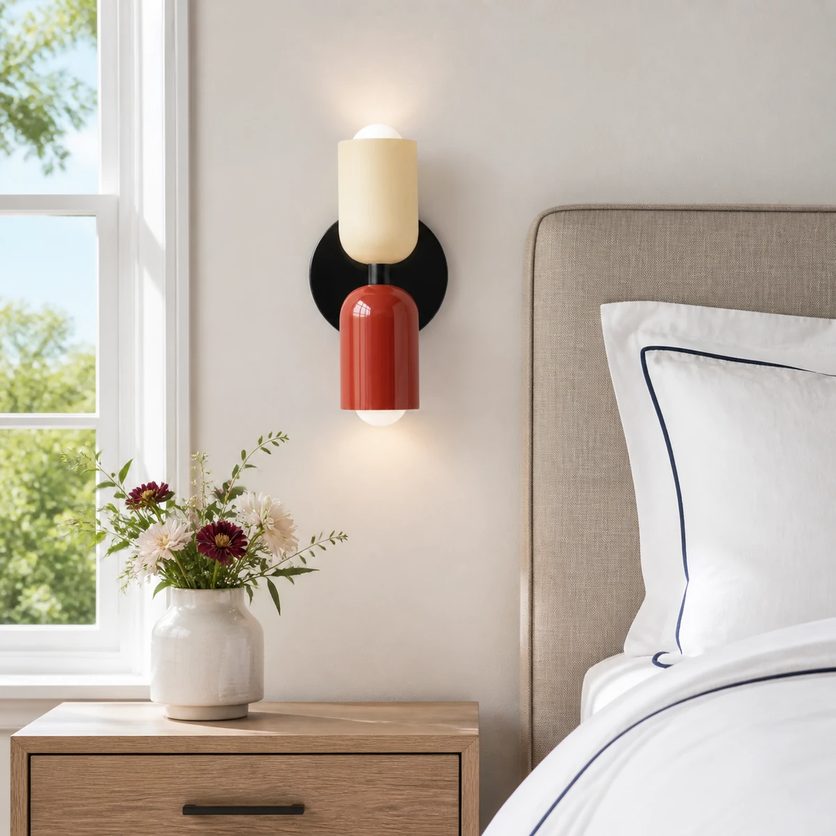 Barra wall light beside a bright modern American bed
