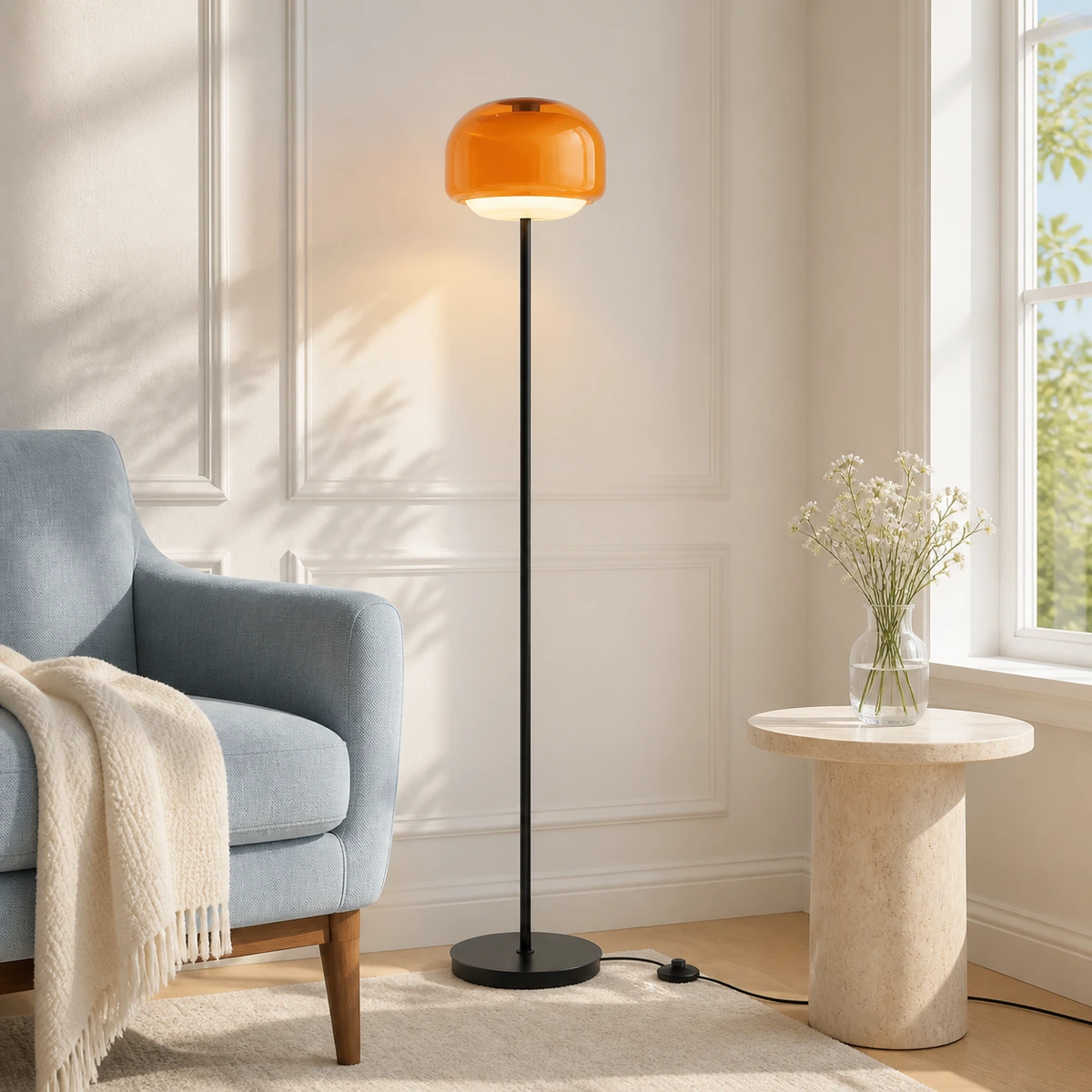 Orange Sanae floor lamp beside a blue reading chair