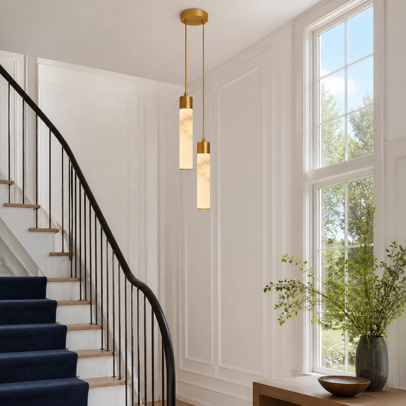 Two-head Ismara pendants at a bright stair landing