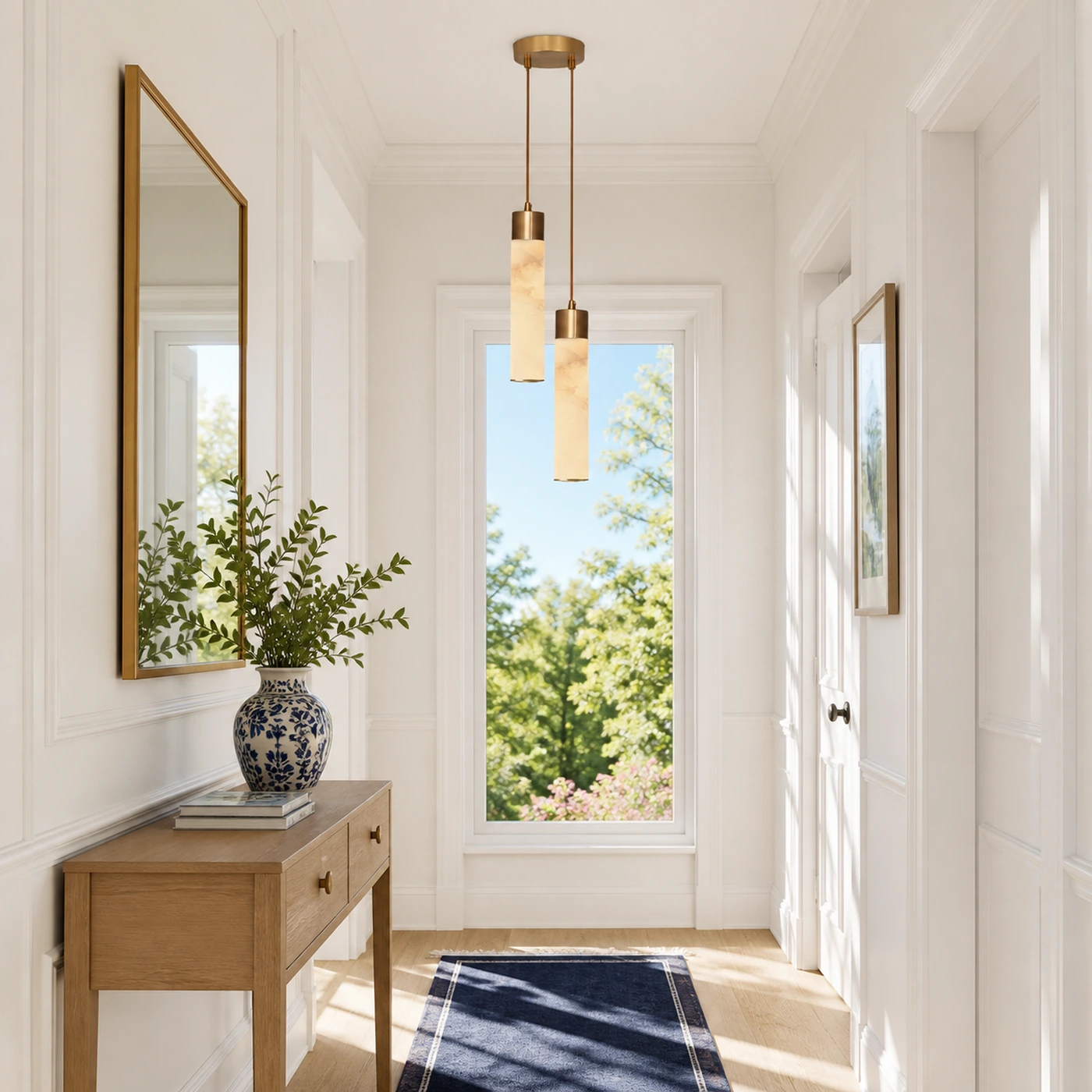 Two-head Ismara pendants in a bright entry hall