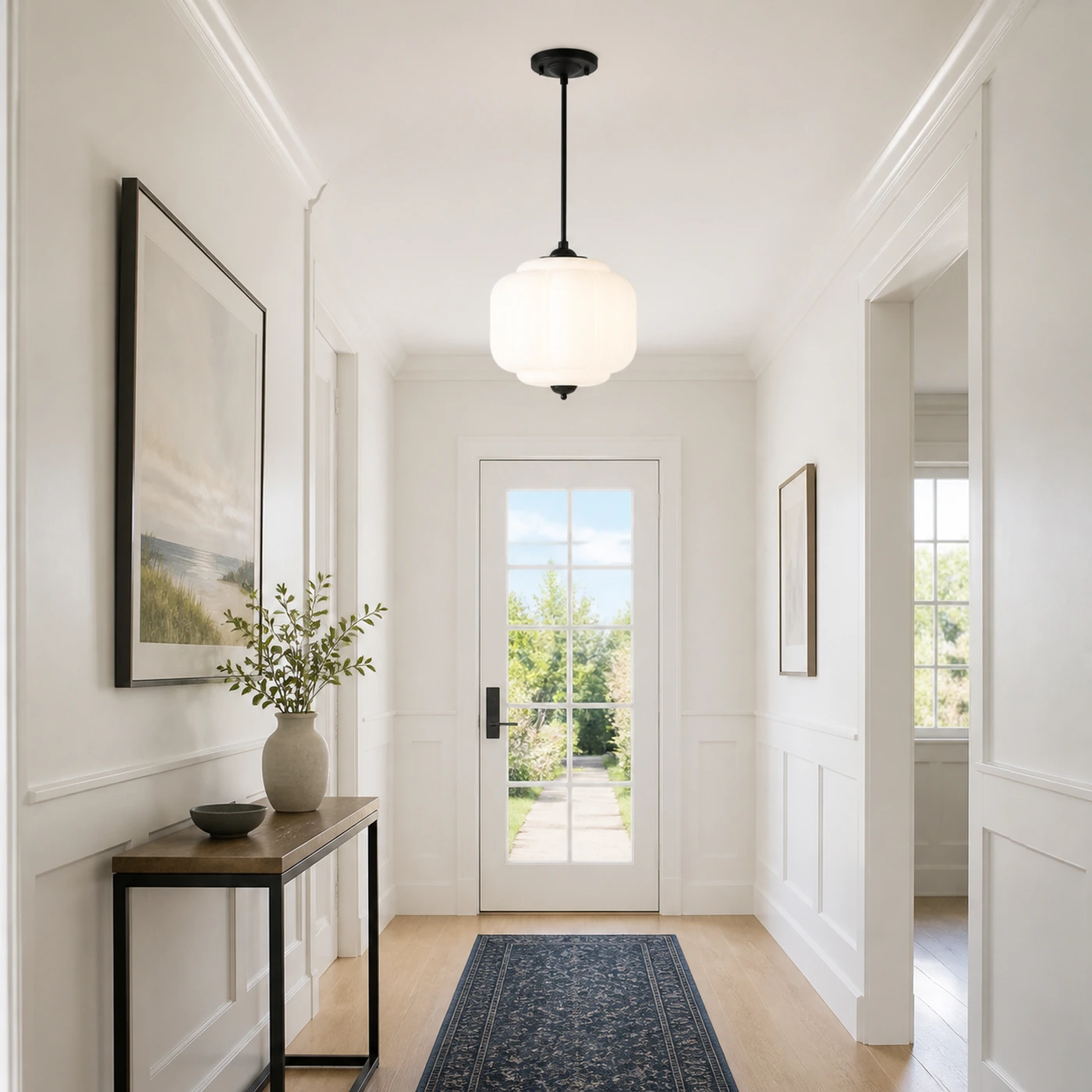 White Glass and Black Mia in a hallway