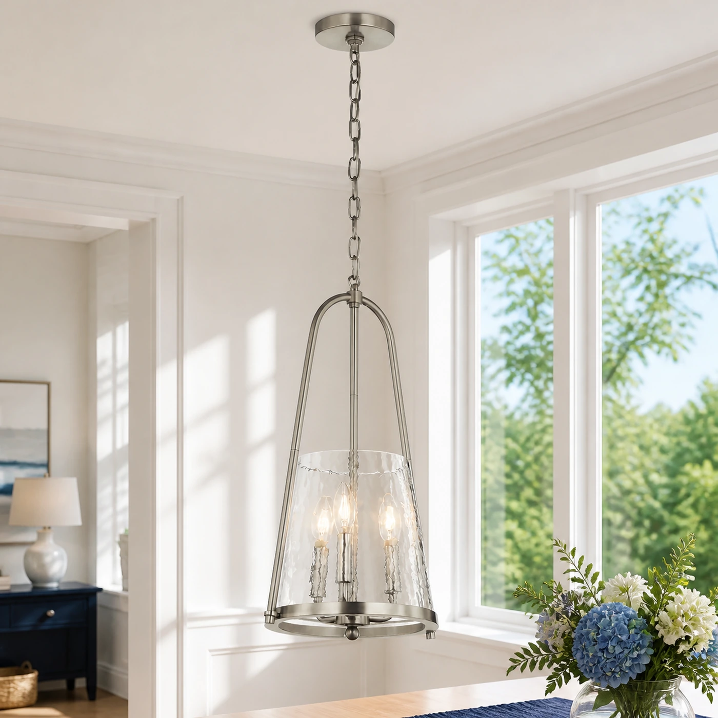 Brushed Nickel Qorlen pendant in direct daylight