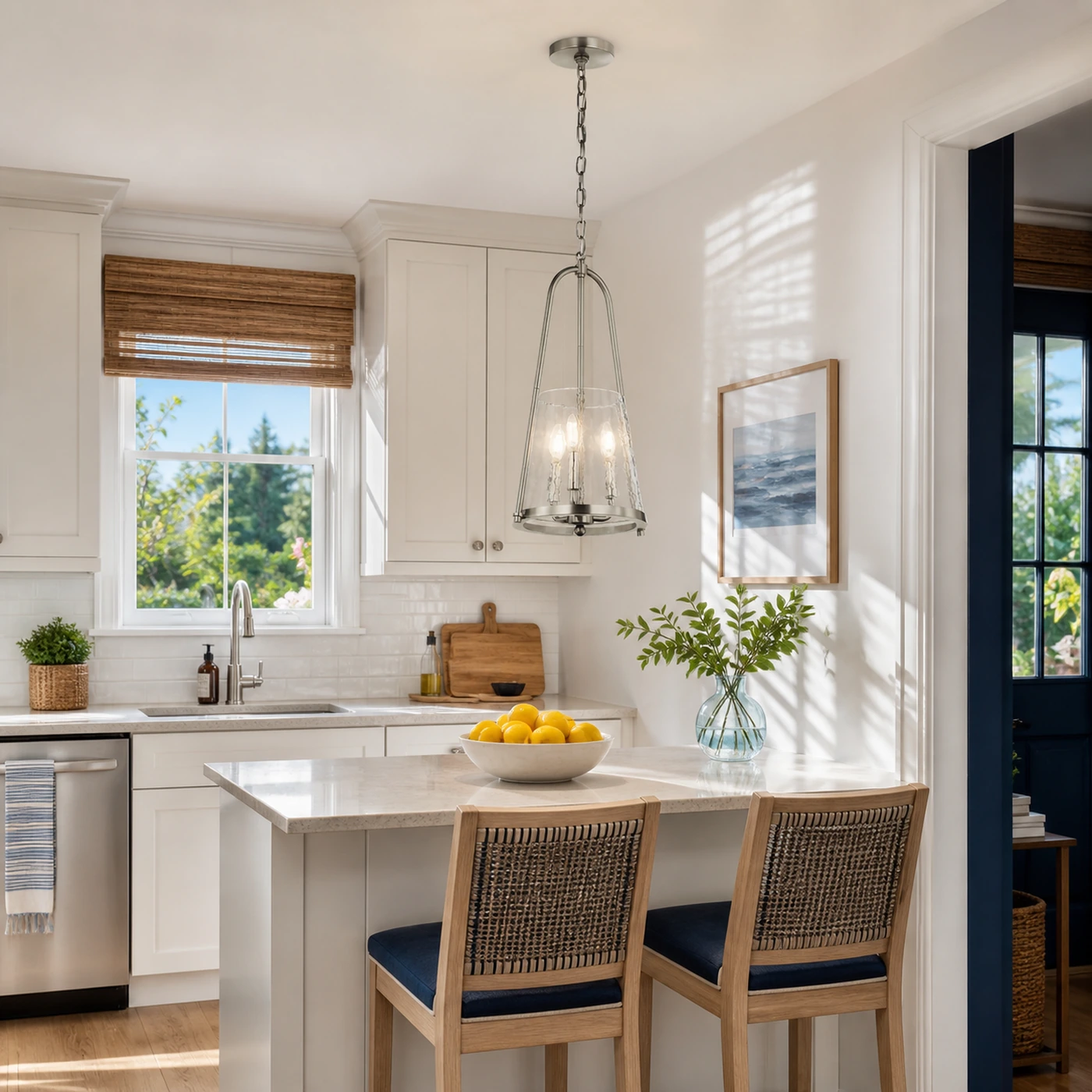 Brushed Nickel Qorlen pendant in a bright kitchen nook