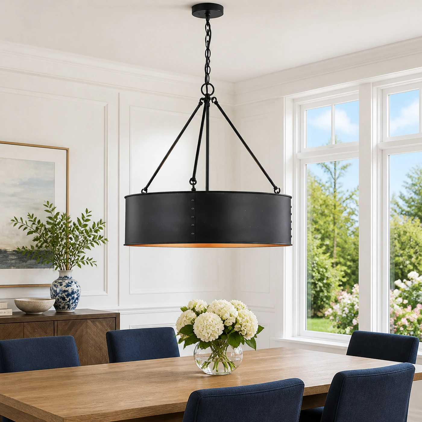 Quillan black drum pendant in a bright sunlit dining room