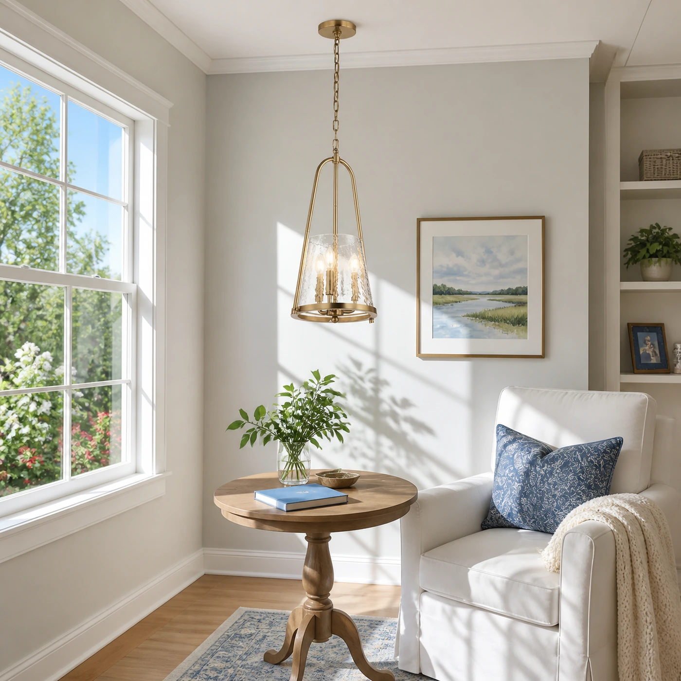 Champagne Bronze Qorlen pendant in a bright reading room