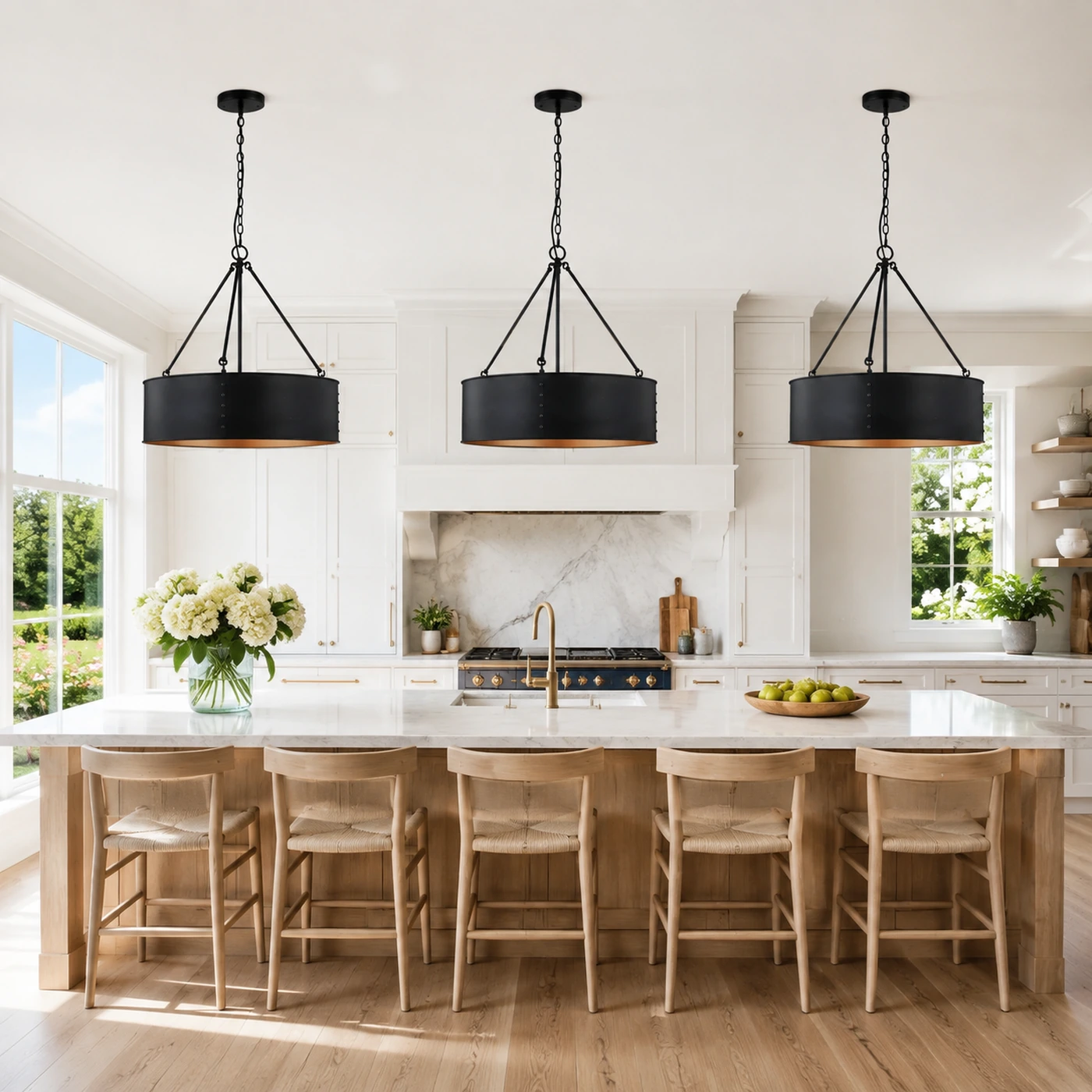 Three Quillan fixtures over a long kitchen island