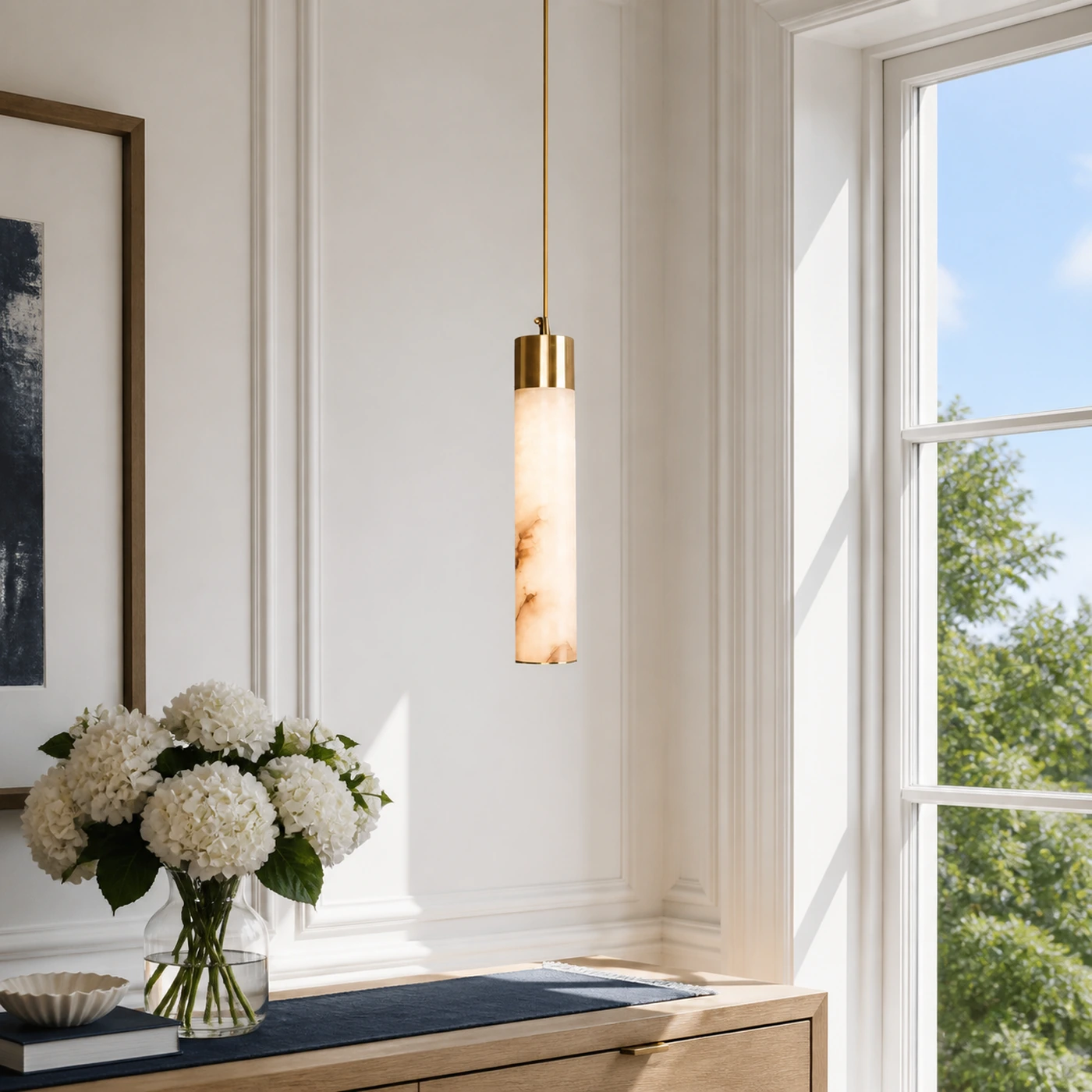 Ismara alabaster brass pendant in a sunlit entry