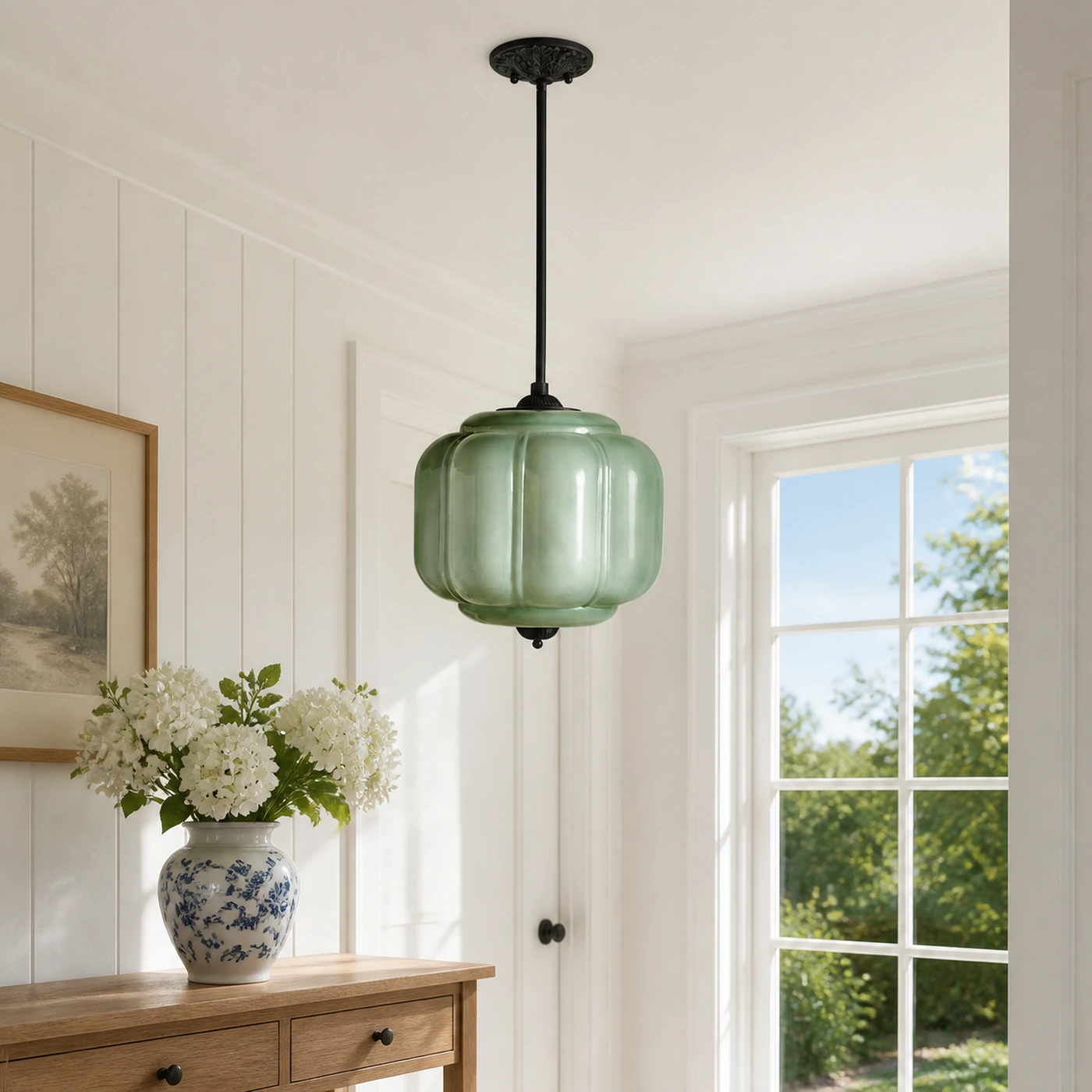 Mia Green Glass and Black pendant in a bright modern American entry