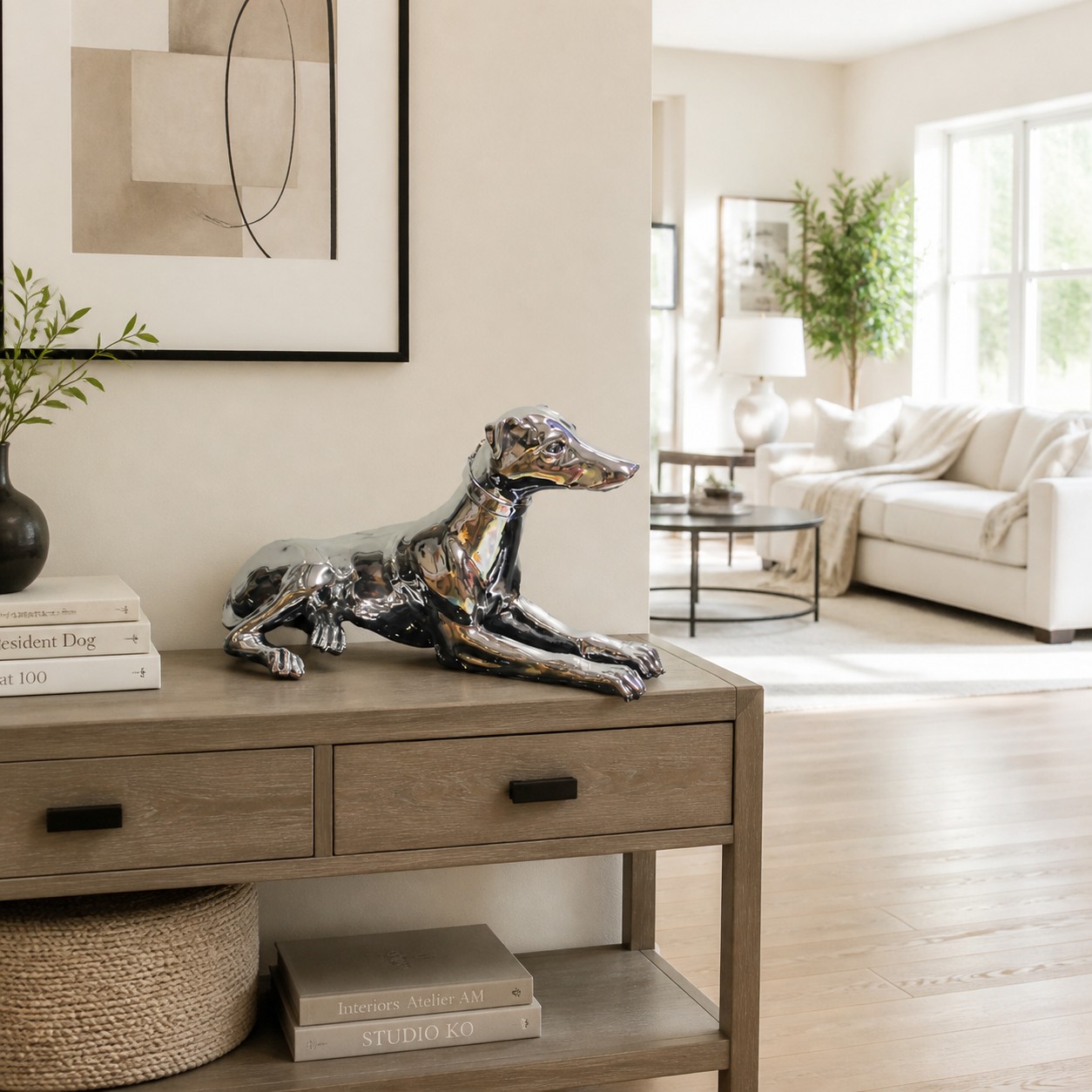 Miloche silver greyhound sculpture on a living room console