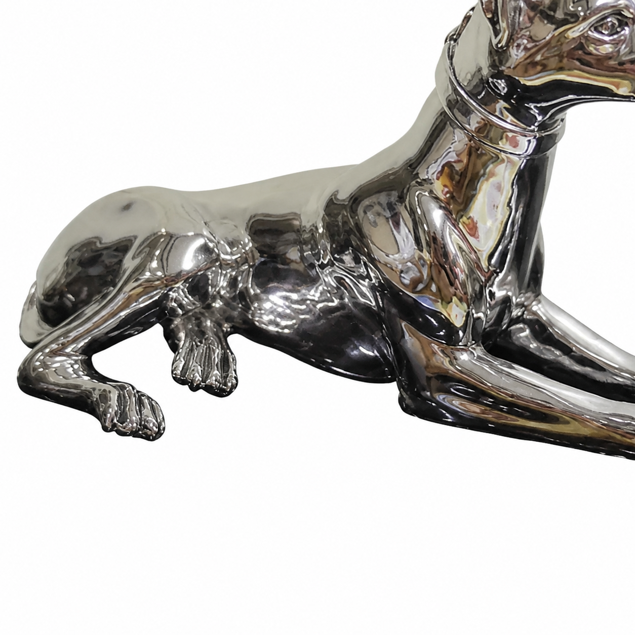 Close detail of the Miloche greyhound sculpture body and legs on white