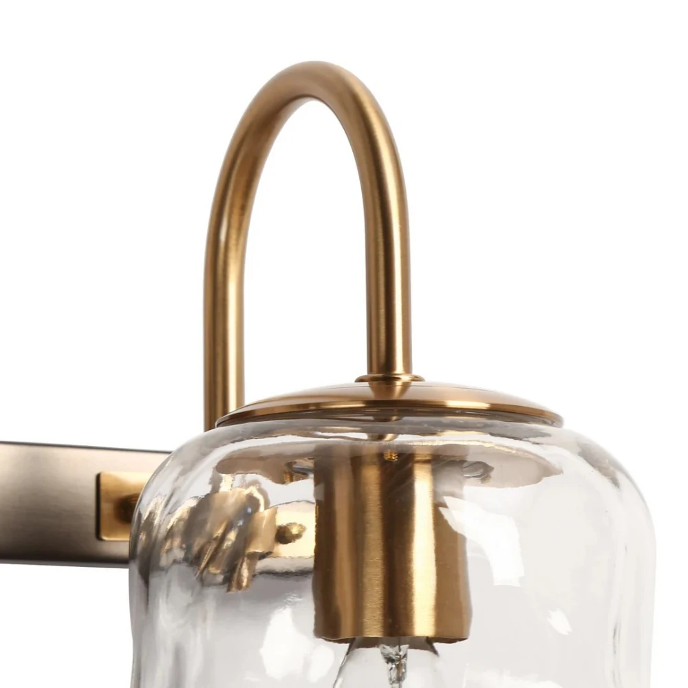 Close view of the Blythe hammered glass shade and brass socket