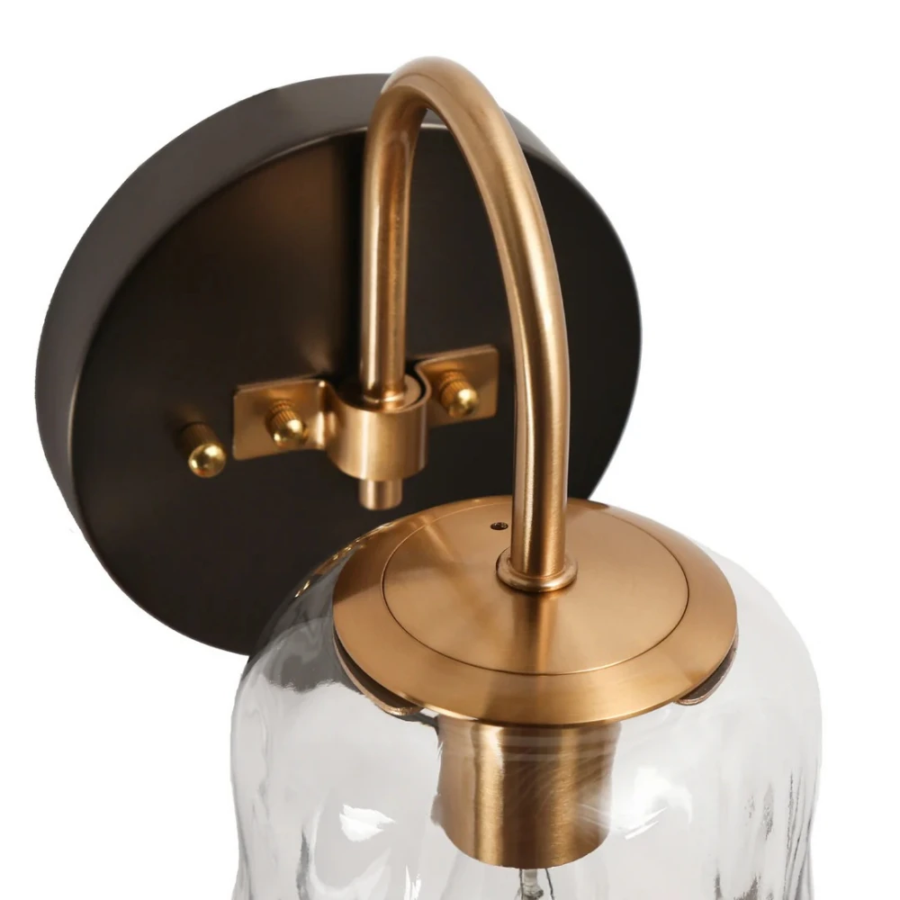 Close view of the Blythe brass loop and upper glass fitting