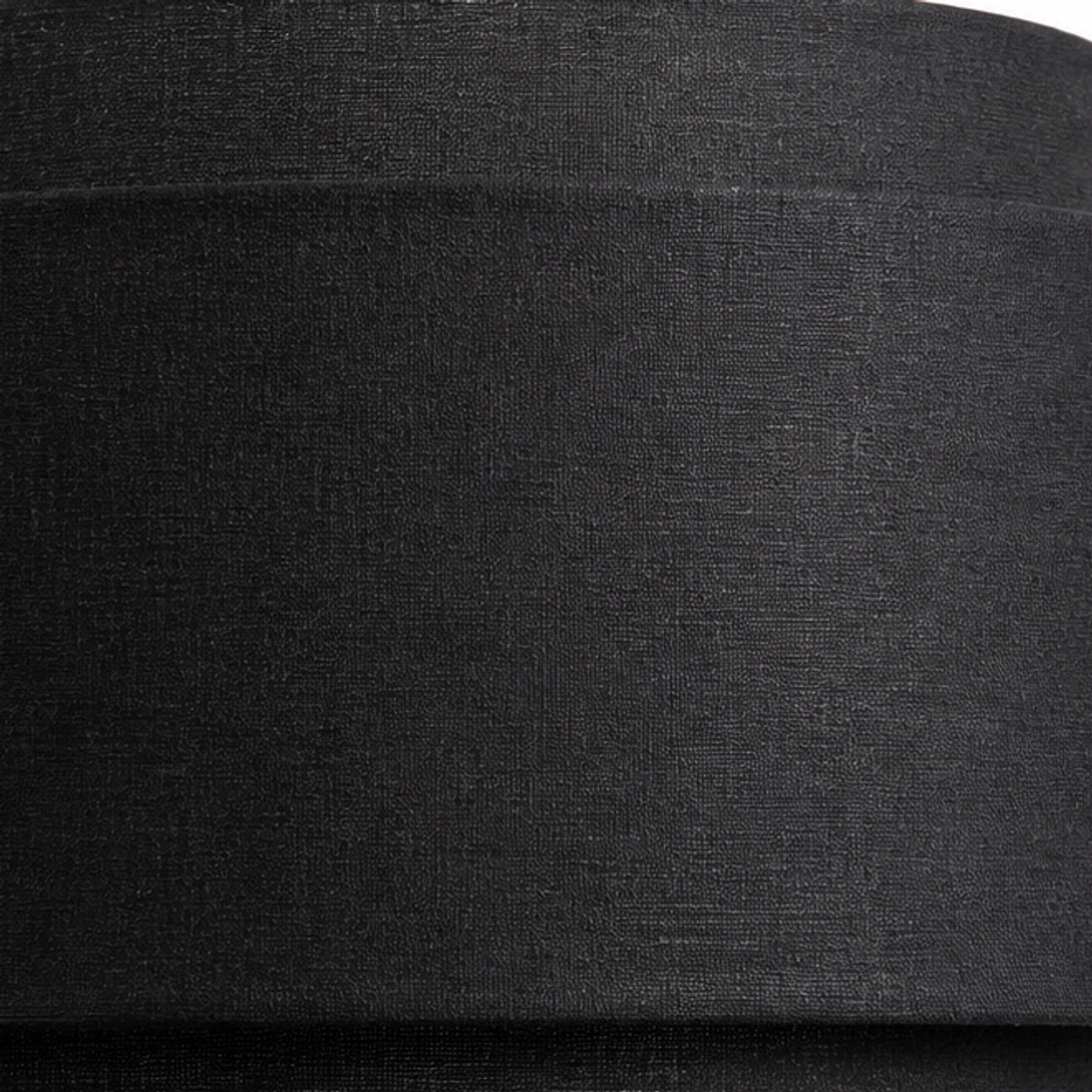 Macro close view of the Hayden black linen texture and layered shade edge