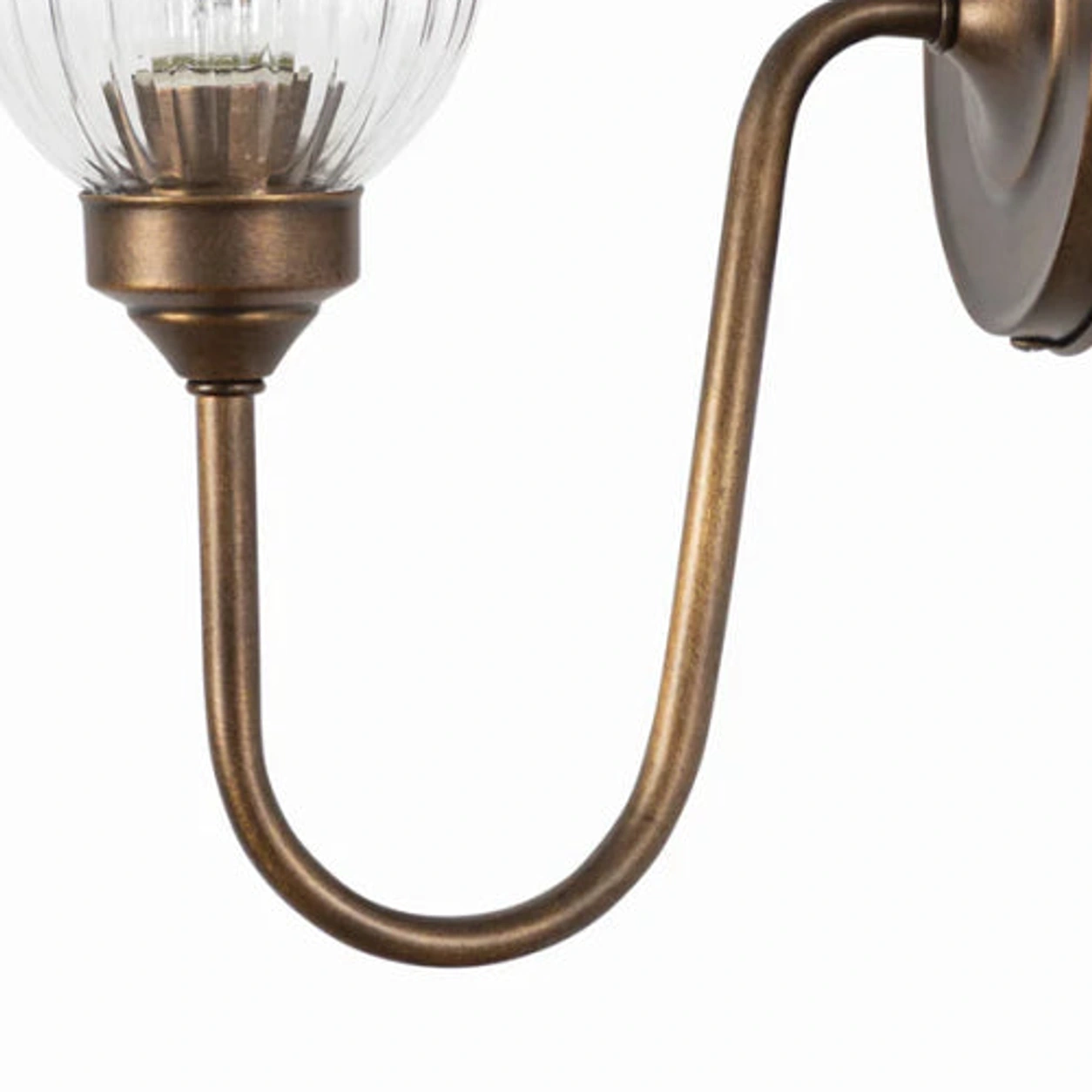Close view of the Menae Burnished Brass U-shaped arm