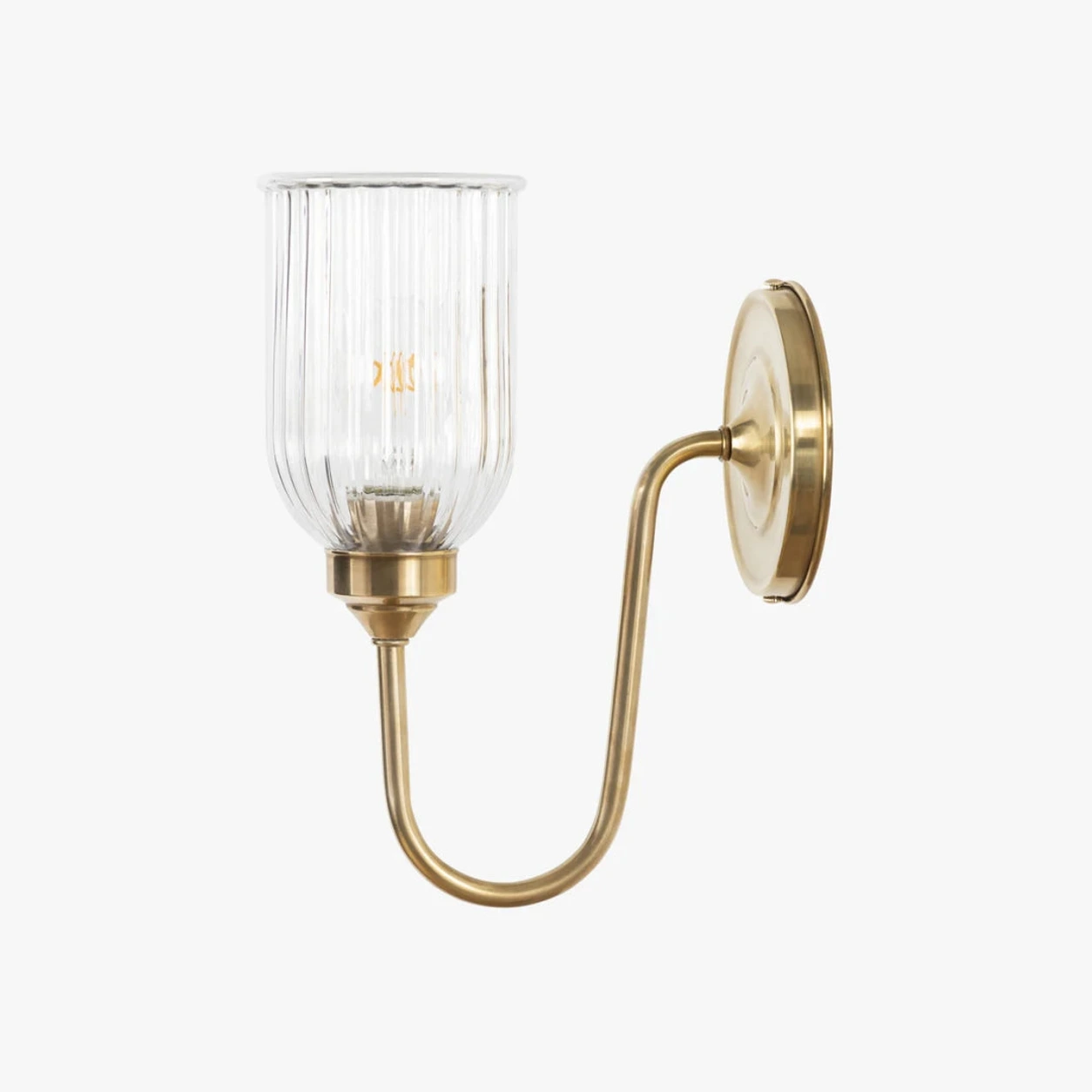 Menae Antique Brass wall sconce on white