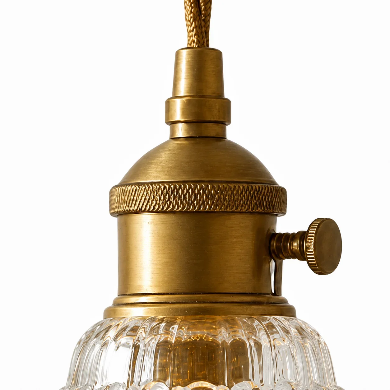 Close view of the Davit pendant light's sculpted clear glass petals