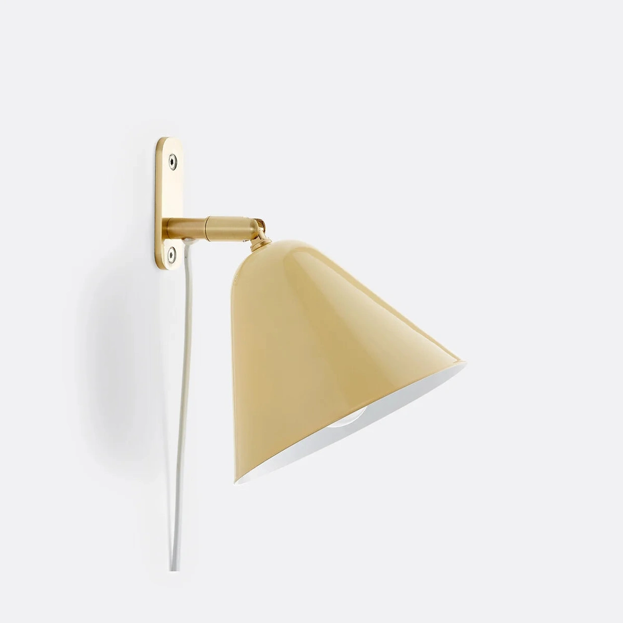 Vanilla Phrike wall sconce on white