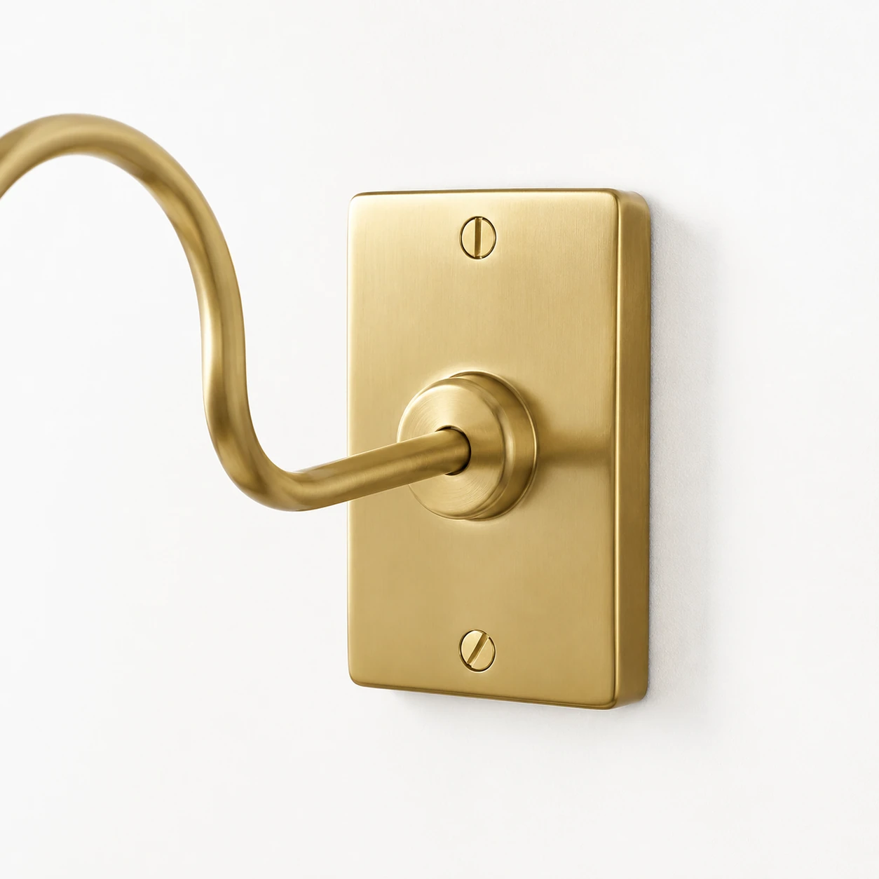 Close detail of the Antaeus curved arm and round wall backplate