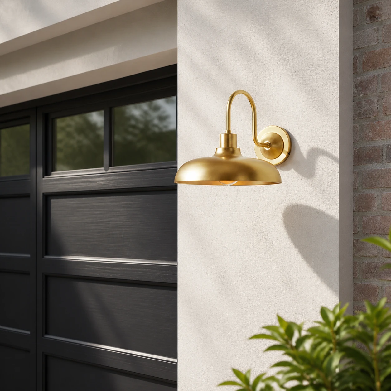 Antaeus dome wall sconce at a garage entry