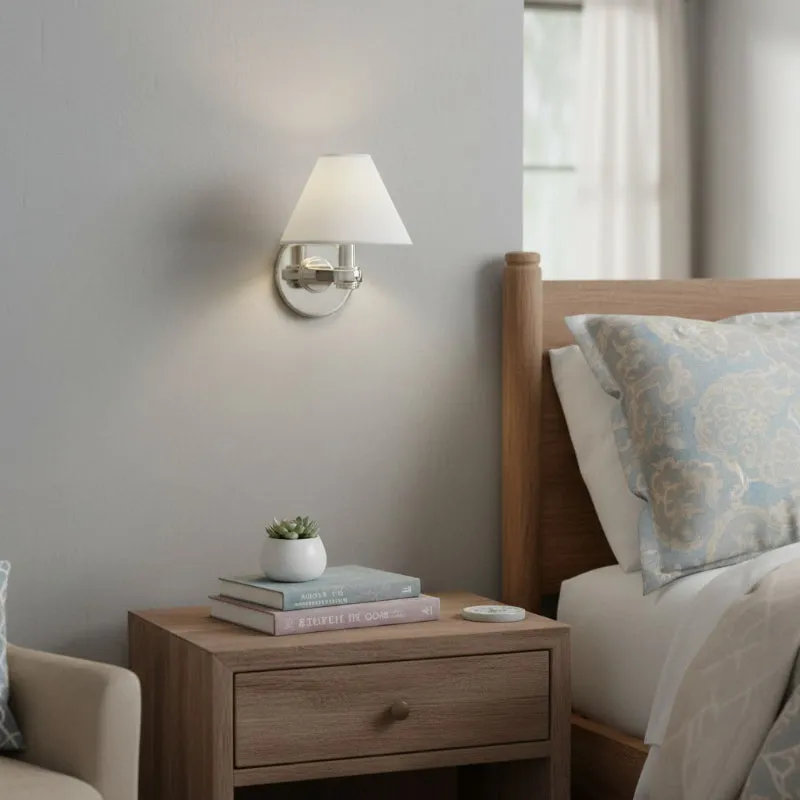 Everett wall sconce styled in a bedroom